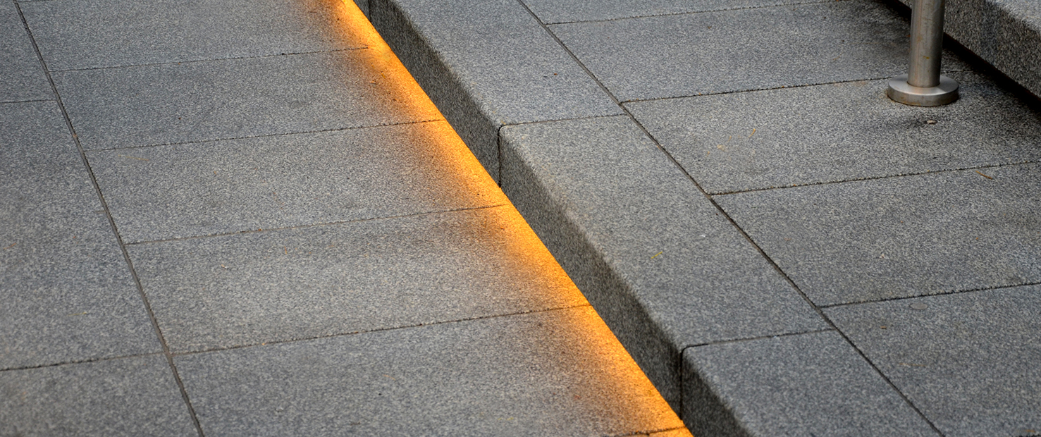 outdoor stairs with underlighting; durable outdoor lighting for visibility and enhanced aesthetics.